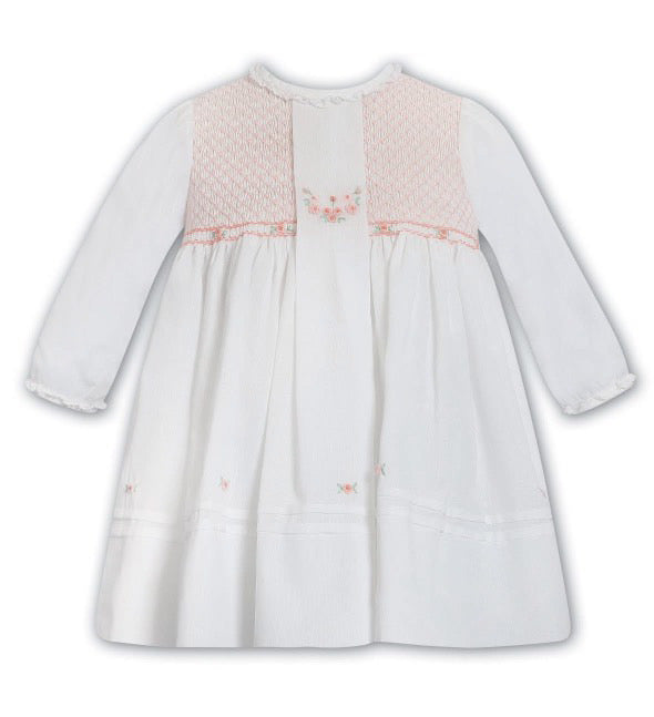 Sarah Louise ivory & peach baby girls smocked dress C7002