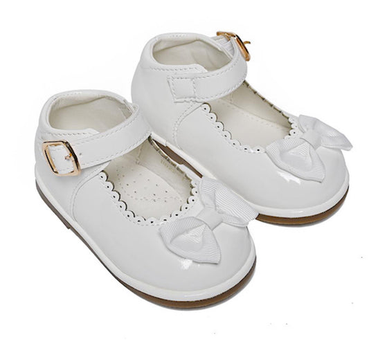Tia London white patent shoes