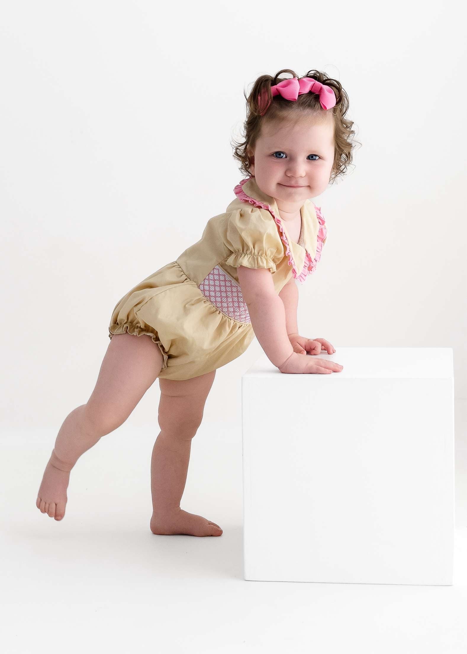 Cream & pink smocked baby girls rompers